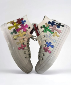 White Converse shoes with colorful cross patterns on the upper, cool.