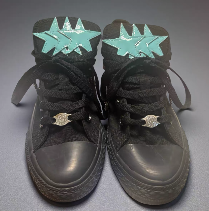 Black Converse shoes with blue star pattern - Image 2