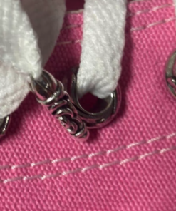 Alternative view of Pink Converse shoes with a white cross pattern on the upper