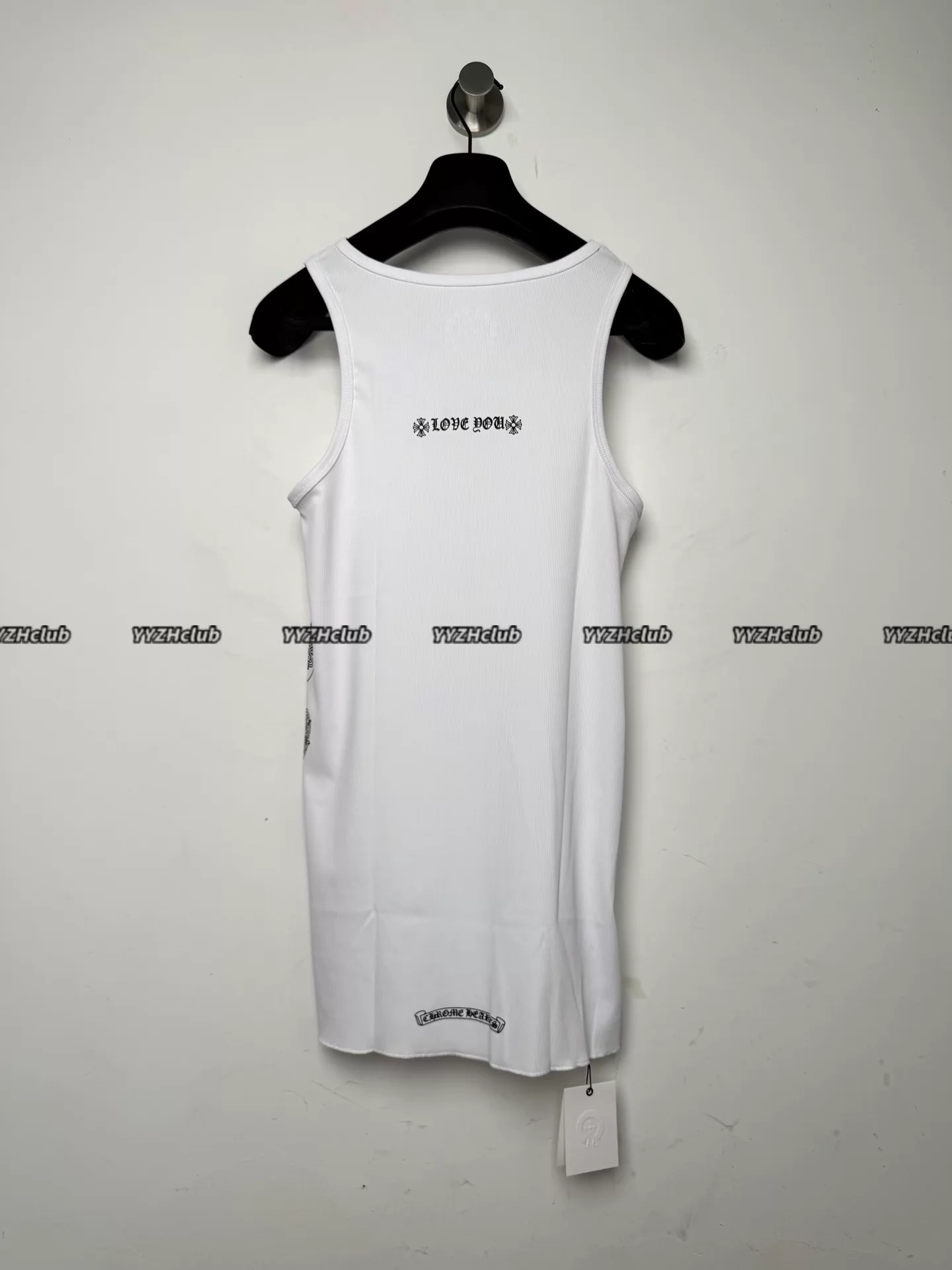 Alternative view of ChromeHearts heart-shaped vine design, white waffle vest with slogan on the chest.